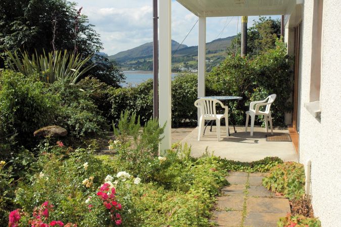 Tigh Charrann has a pleasant and secluded garden from which there are excellent loch and mountain views.